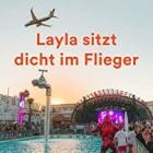 Layla sitzt dicht im Flieger